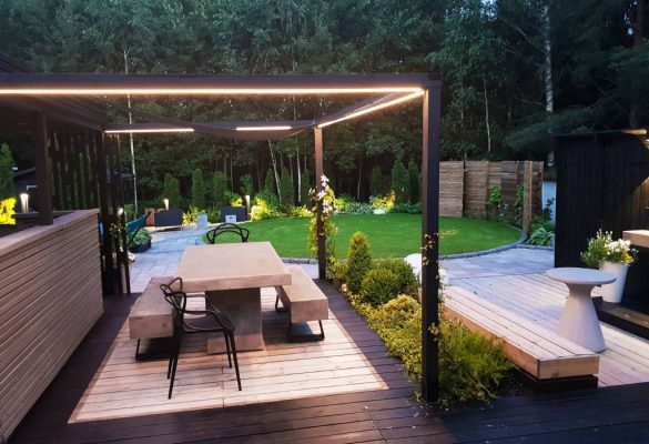 Black courtyard luminaires blend in with the surroundings